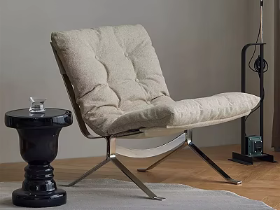 Modern Beige Tufted Lounge Chair With Metal Frame And Black Side Table On Wooden Floor 3d model