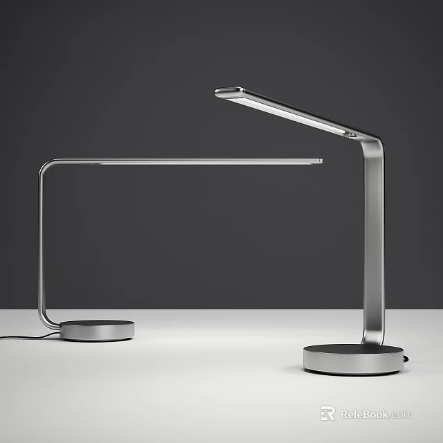 Modern Silver Metal Desk Lamp With Sleek Adjustable Arm And Stable Base 3d model 