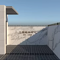 Modern Front Desk Reception Area With Glass Doors And Marble Wall Features