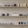 Neatly Arranged Various Tea Sets On Multiple Shelves With Teapots Teacups And Ceramic Caddies