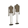 Wooden Human Body Mannequins Standing On Metal Stands Against White Background