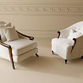 White Lounge Chairs Featuring Wooden Arms Button Tufted Backs and Ornate Wall Molding