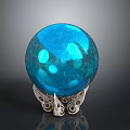 Shiny Blue Glass Sphere Decorative Art Piece With Intricate Silver Base Stand