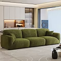 Green Plush Multi Seater Sofa In Modern Interior With White Cabinets Open Shelf Lighting