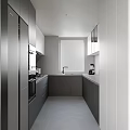 Modern Kitchen Interior With Gray Cabinetry Stainless Steel Appliances Sink And Sleek Countertop