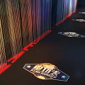 Modern Office Corridor With Colorful Vertical Lines And Branded Floor Design