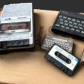 Vintage Electronic Devices Including Tape Recorder Cassette Tapes Keyboard And Calculator