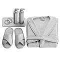 Cozy Daily Bath Essentials Including Bathrobe Slippers Lotion Bottles Wooden Tray and Hair Scrunchies