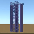 Tall Blue Metal Staircase With Platform And Cylindrical Support Column In Outdoor Sandy Area