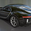 Sleek Black Luxury Sports Car With Aerodynamic Design And Shiny Alloy Wheels