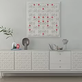 White Carved TV Stand With Cabinets Drawers Decorative Items And Red Dot Wall Art