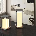 Two Square Design Outdoor Lights With Metal Frame And White Lampshade On Table