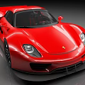 Red Sports Car with Sleek Aerodynamic Body Black Wheels and Front Fascia Design
