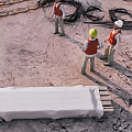 Cartoon Construction Site Scene With Workers in Safety Gear and Covered Object and Steel Cables