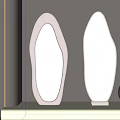 Irregular Shaped Mirrors With White Frame And Moon Shaped Lamp Reflecting Sky And Trees
