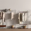 Modern Metal Clothes Racks with Hanging Light Colored Clothes Shoes Baskets and Hats