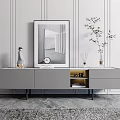 Modern Gray TV Stand With Decorative Painting Table Lamp Vases And Plant On Paneled Wall