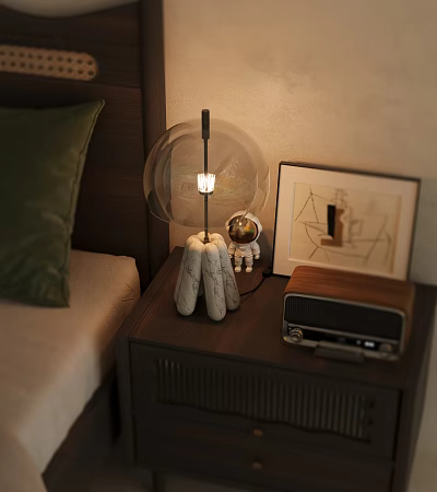 Glass Globe Table Lamp on Wooden Nightstand with Astronaut Figurine Vintage Radio and Green Pillow 3d model