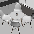 Modern Round White Table And Chairs Set With Wooden Legs Near Window