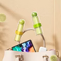 Transparent Cylindrical Cosmetic Products With Green Yellow Labels Tablet And Headphones In Bag