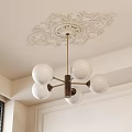 Modern Chandelier With White Spherical Shades Metal Frame And Ceiling Medallion In Minimalist Room
