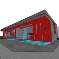 Modern Museum Building With Red And Gray Geometric Facade Overhanging Roof And Glass Entrance