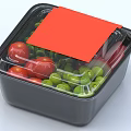 Fresh Red and Green Fruits in Black Plastic Container with Transparent Lid and Red Label