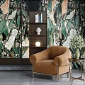 Brown Textured Single Seater Sofa In Room With Green Marble Wallpaper Side Table And Bookshelf