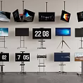 Multiple TVs Hanging And On Stands With Time Displays Scenic Views And Interfaces