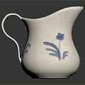White Ceramic Pitcher With Blue Floral Patterns And Curved Handle