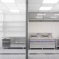 Modern Commercial Kitchen With Stainless Steel Worktables Cabinets And Ventilation