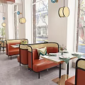 Cozy Restaurant Interior With Blue White Tile Lantern Decor Rattan Chairs And Booth Seating