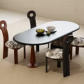 Oval Black Dining Table Set With Brown Base Four Chairs Wooden Frames And Patterned Cushions 3d model