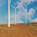White Wind Turbine Towers Standing In Desert Landscape With Blue Sky And Clouds