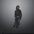 Woman in Gray Headscarf and Robe Sitting Against Gray Background with Hands Folded on Lap