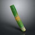Green And Yellow Bamboo Stem With Smooth Texture Isolated On Dark Background