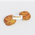 Golden Brown Swirled Cinnamon Rolls With Soft Texture Freshly Baked For Breakfast Treat