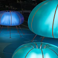 Colorful Jellyfish Shaped Table Lamps With Metal Legs Illuminated On Hexagonal Surface