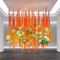 Stunning Indoor Hanging Installation With Orange Vertical Rods And White Green Blooms