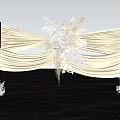 Elegant Floral Installation With Beige Pleated Fabric And Light Colored Flowers Feather Accents