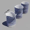 Industrial Equipment Featuring Intact And Damaged Blue Barrels With Metal Fragments