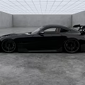 Black Sports Car With Wide Body Kit Rear Spoiler And Alloy Wheels