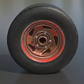 Car Tire With Black Tread Red Rim And Detailed Metal Texture Design