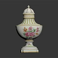 Ornate White Ceramic Urn With Floral Patterns Lid And Gold Trim Base