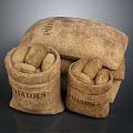 Sacks of Potatoes Filled With Fresh Tubers Stacked on Dark Background