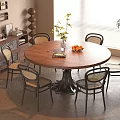Round Wooden Dining Table Set With 6 Chairs Metal Base Fruit Bowl And Potted Plant