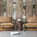 Casual Sofa Set Featuring Two Brown Lounge Chairs Wooden Table Woven Screen And Green Plant