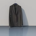 Dark Brown Suit Hanging On Hanger Against White Wall With Gray Floor Reflection