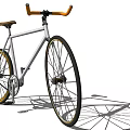 White Frame Fixie Bicycle With Brown Seat Orange Handlebars And Gold Rims