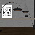 Modern Black Arched Floor Lamp In Room With Gray Wall And Wooden Floor